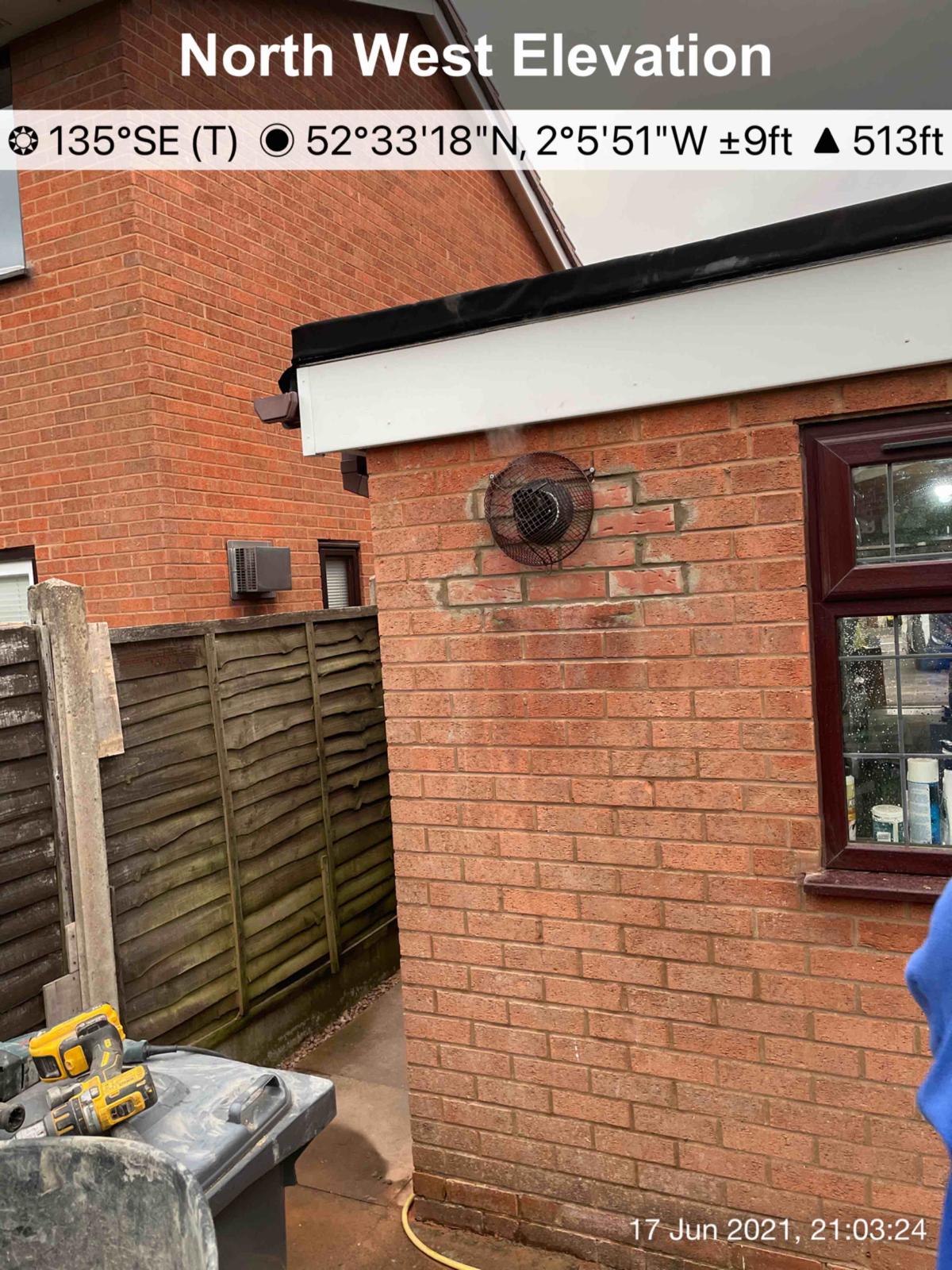 Exterior wall showing new flue terminal and brickwork on north west elevation in Walsall
