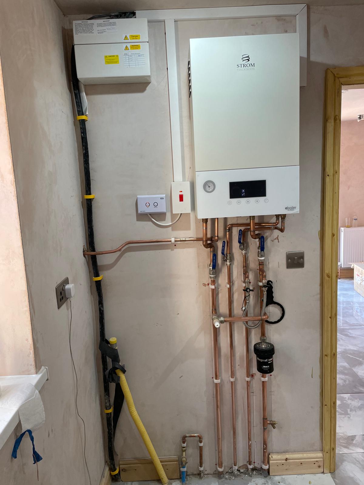 Strom electric boiler with consumer unit and control panel fitted in Wolverhampton property